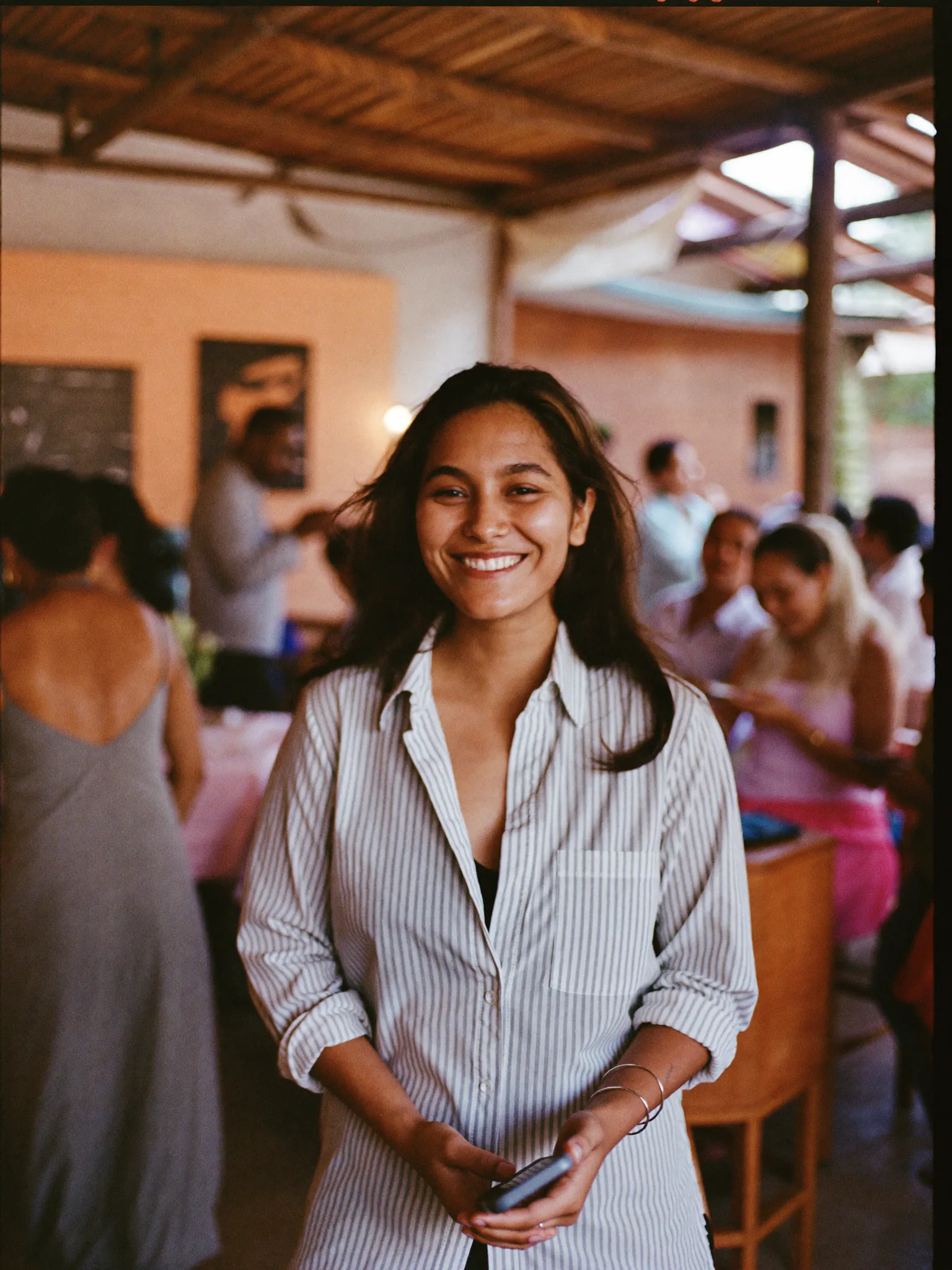 A Nepali event host welcoming guests